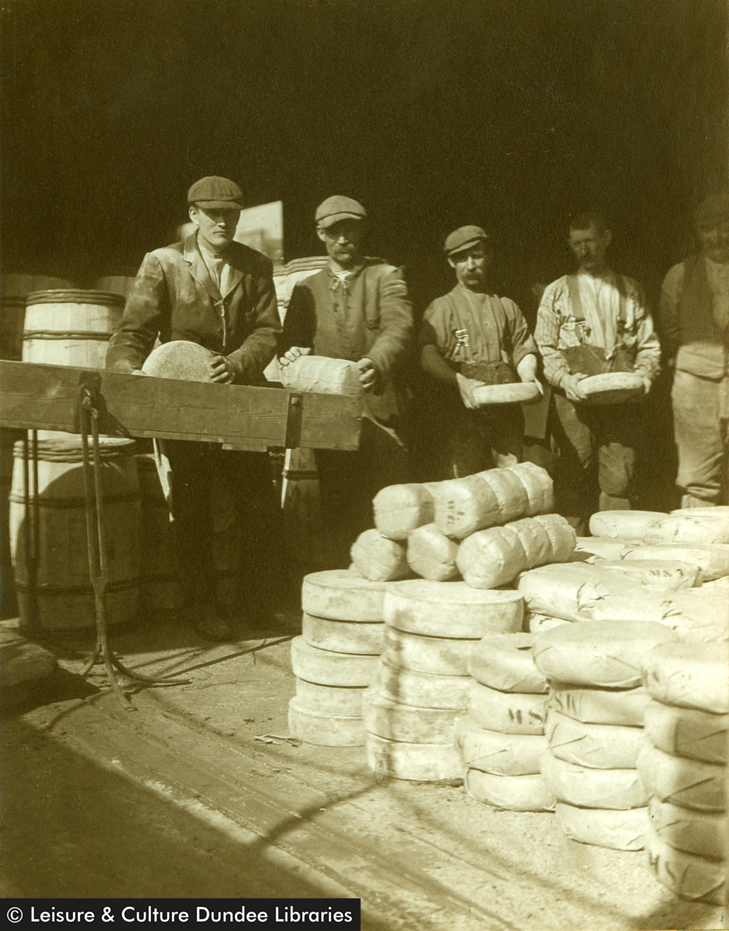 Dockworkers unloading ships