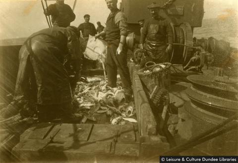 Fishermen aboard a trawler